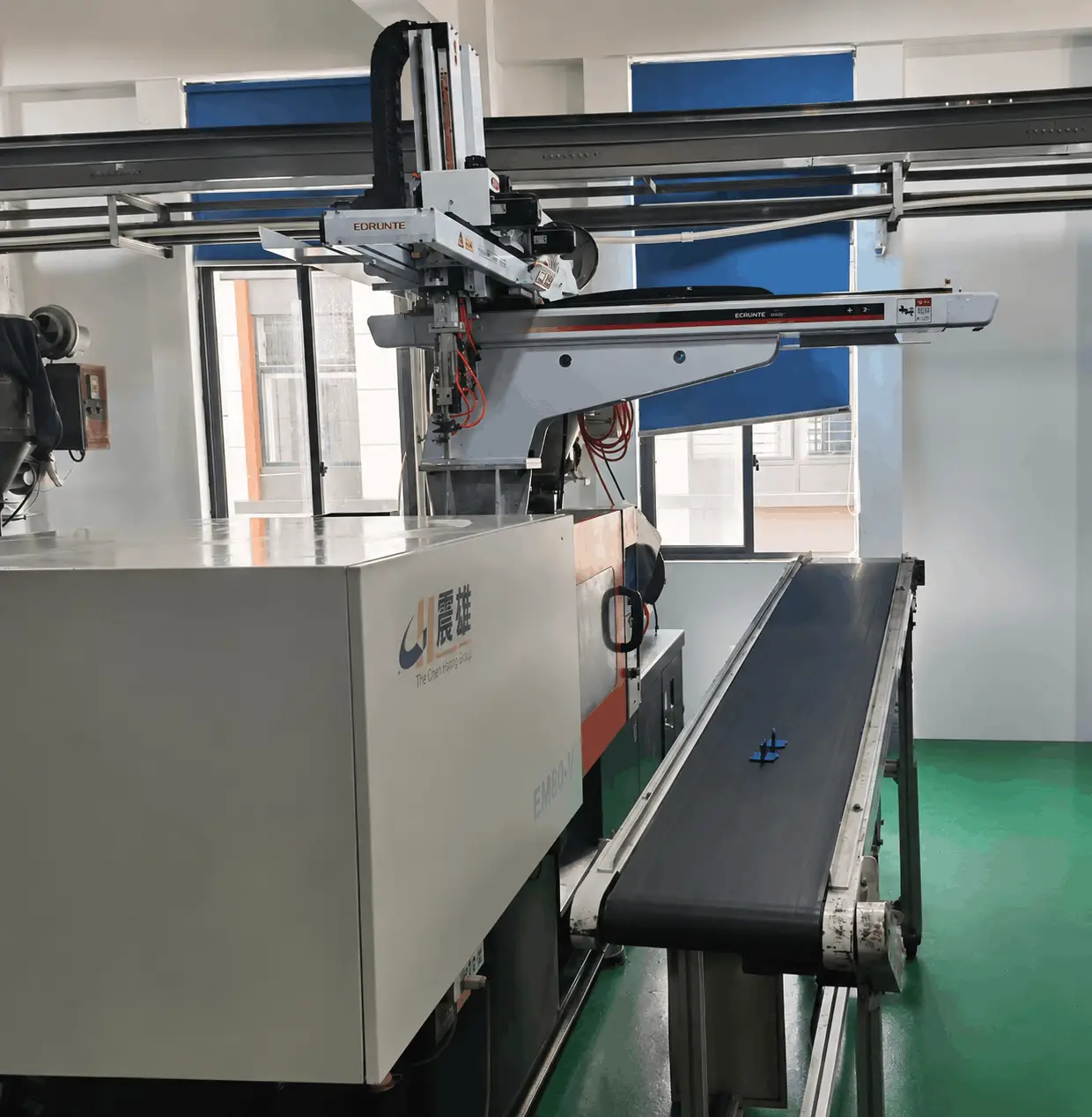 Automated assembly machine producing wax guard filters for hearing aids