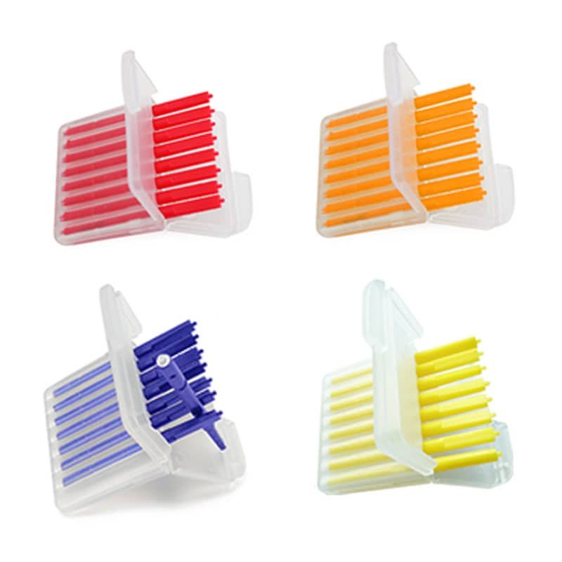Red, orange, blue, yellow color-coded Phonak wax guards