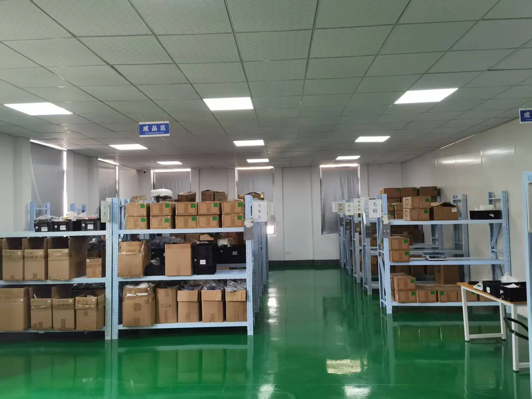 Climate‑controlled warehouse for hearing aid accessories – organized shelving with wax guards, domes, and filters